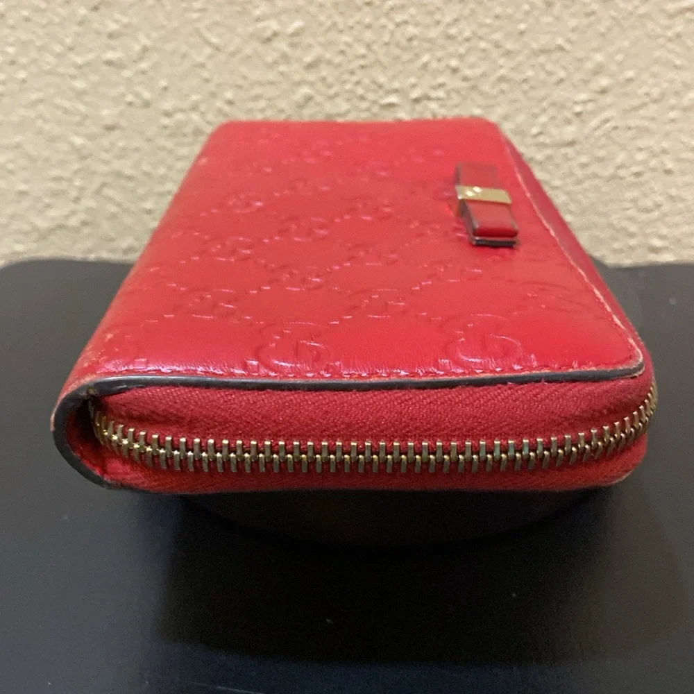 Beautiful red Gucci Guccissima bow zip wallet. β€οΈ - Picture 4 of 12